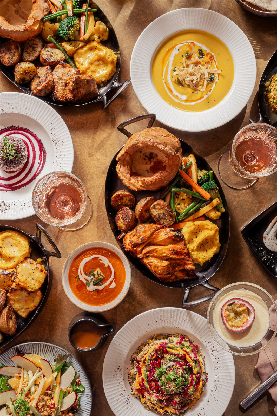 Sunday roast dishes spread on a table at dabbawal restaurant